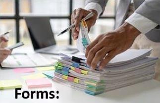 hands riffling through stack of paper